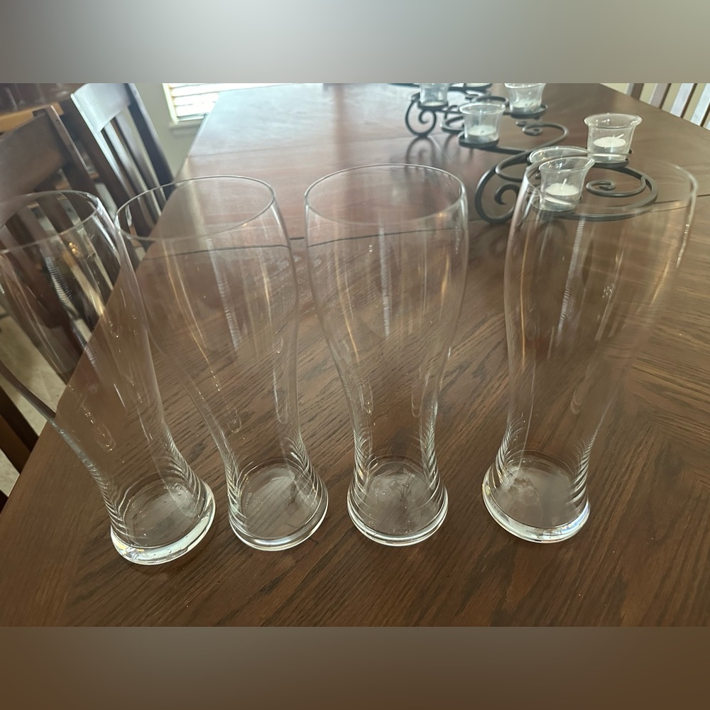 Four 24oz beer glasses, never used.